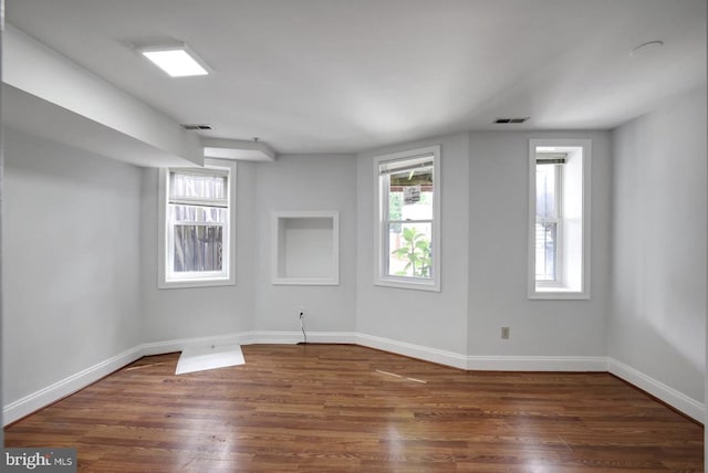 1316 Irving St NW, Washington, DC 20010 - empty room featuring wood finished floors and baseboards