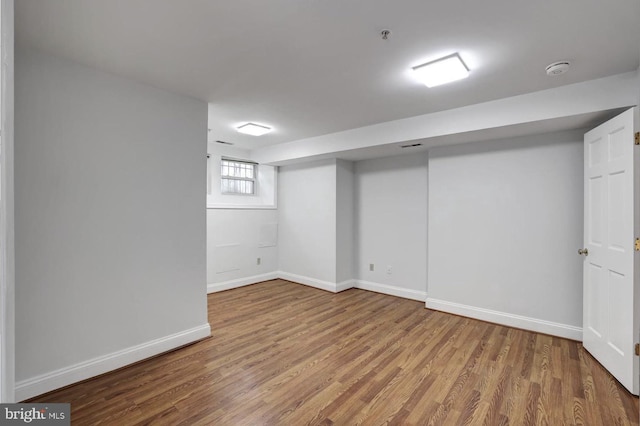 1316 Irving St NW, Washington, DC 20010 - basement featuring wood finished floors and baseboards