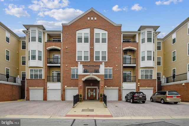 8609 Wintergreen Ct Unit 304, Odenton, MD 21113 - view of property with a garage and driveway