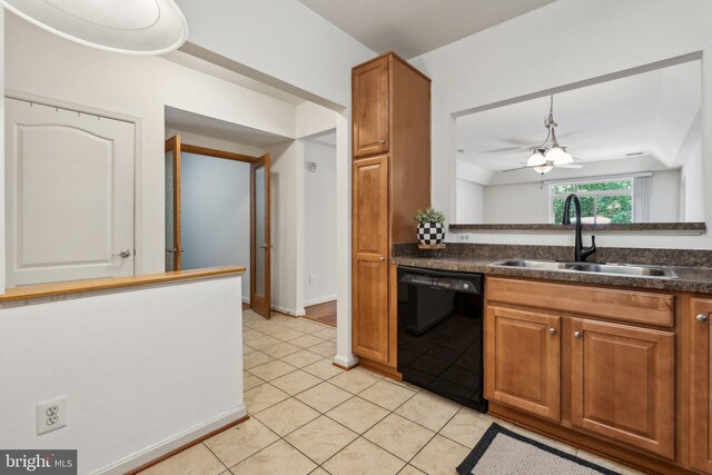 8609 Wintergreen Ct Unit 304, Odenton, MD 21113 - kitchen with black dishwasher, a sink, dark countertops, and brown cabinetry