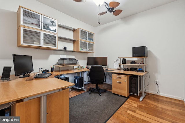 8609 Wintergreen Ct Unit 304, Odenton, MD 21113 - office area with light wood-style floors, ceiling fan, and baseboards