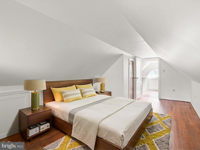 8301 Crestridge Rd, Fairfax Station, VA 22039 - bedroom with vaulted ceiling and wood finished floors