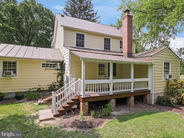 8301 Crestridge Rd, Fairfax Station, VA 22039 - view of front of property featuring covered porch, a standing seam roof, a chimney, and a metal roof