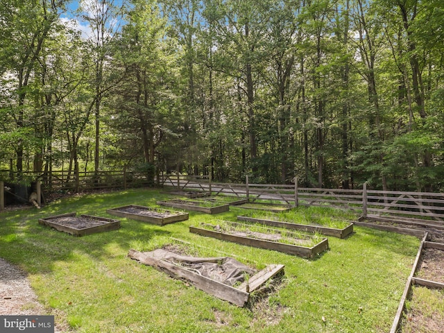 8301 Crestridge Rd, Fairfax Station, VA 22039 - view of yard with a garden
