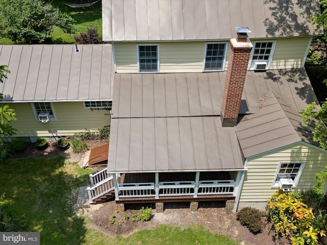 8301 Crestridge Rd, Fairfax Station, VA 22039 - rear view of property featuring a standing seam roof and a metal roof