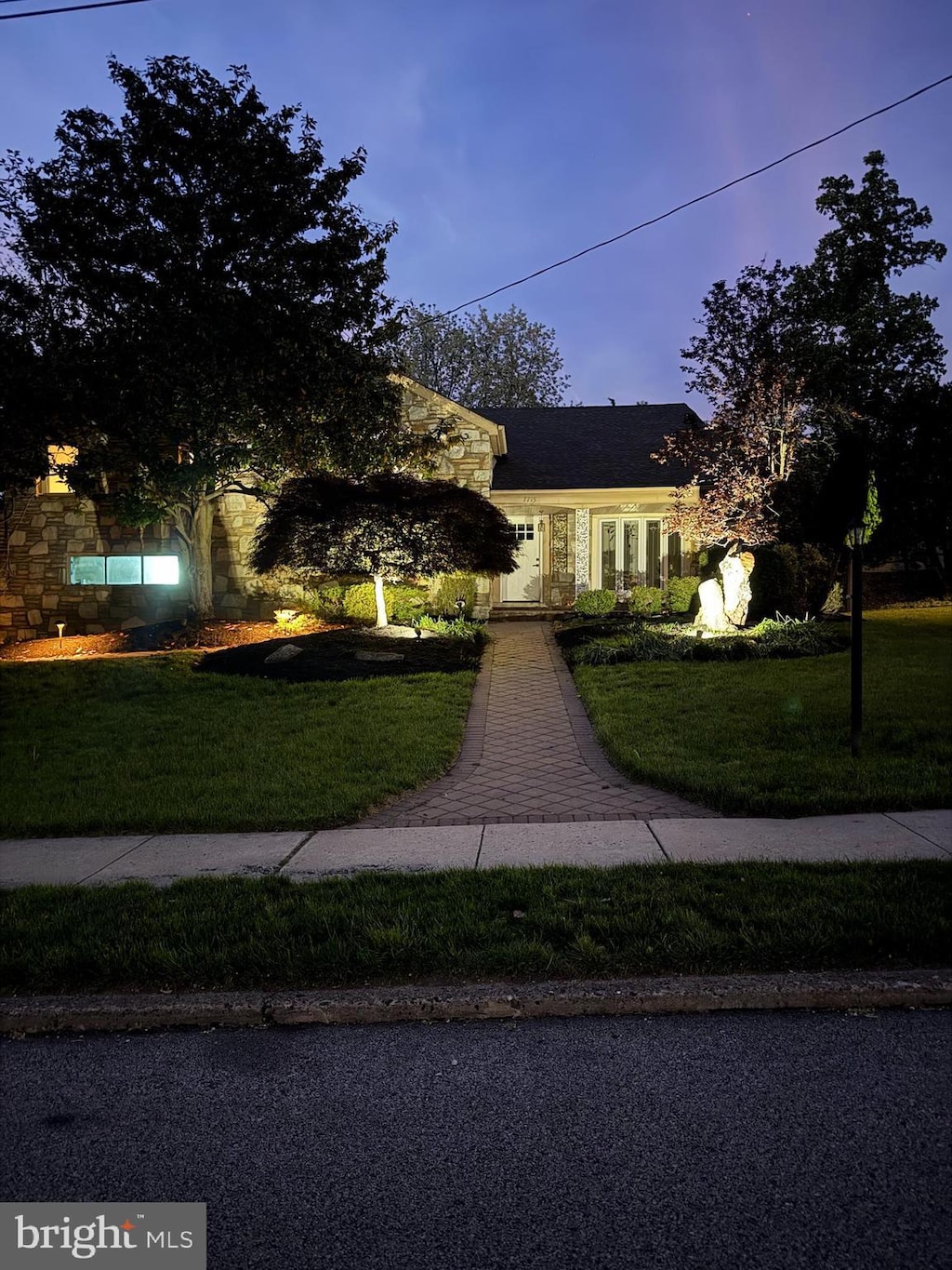 7715 Doe Ln, Glenside, PA 19038 - view of front of property featuring a front yard and stone siding