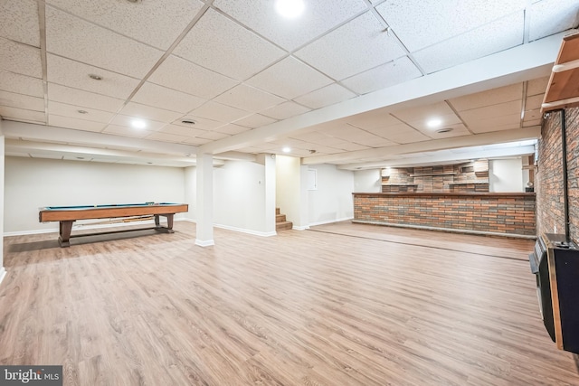 7715 Doe Ln, Glenside, PA 19038 - rec room featuring baseboards, wood finished floors, a paneled ceiling, billiards table, and brick wall