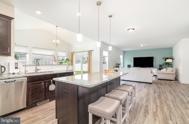 6320 Neha Dr, Mechanicsburg, PA 17050 - kitchen with dishwasher, a sink, dark brown cabinets, light wood finished floors, and vaulted ceiling