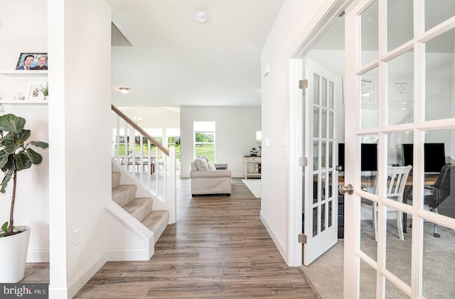 6320 Neha Dr, Mechanicsburg, PA 17050 - foyer entrance featuring stairs, wood finished floors, french doors, and baseboards