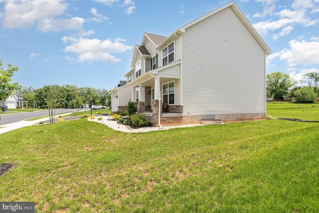6320 Neha Dr, Mechanicsburg, PA 17050 - view of side of property with covered porch and a yard
