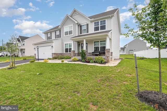 6320 Neha Dr, Mechanicsburg, PA 17050 - view of front of house with a porch, asphalt driveway, stone siding, and a residential view