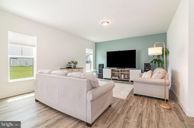 6320 Neha Dr, Mechanicsburg, PA 17050 - living area with light wood-style flooring and baseboards