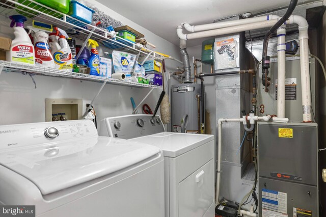 3214 Charing Cross Unit 18, Wilmington, DE 19808 - laundry area featuring gas water heater and separate washer and dryer