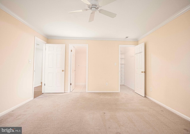 1 Lough Mask Ct Unit 101, Lutherville Timonium, MD 21093 - unfurnished bedroom featuring ornamental molding, carpet flooring, baseboards, ceiling fan, and a spacious closet