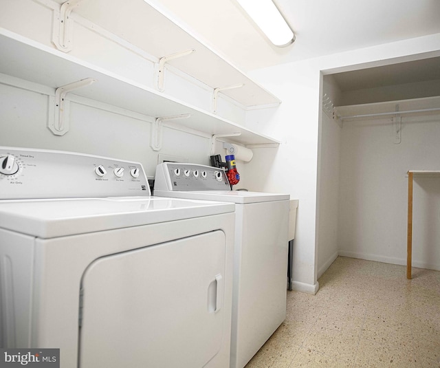 1 Lough Mask Ct Unit 101, Lutherville Timonium, MD 21093 - laundry area with separate washer and dryer, light floors, and baseboards