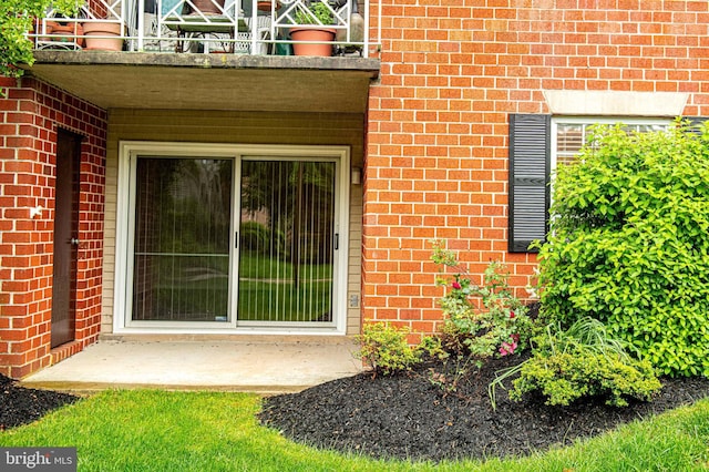 1 Lough Mask Ct Unit 101, Lutherville Timonium, MD 21093 - doorway to property featuring brick siding and a balcony