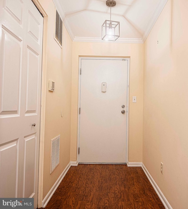 1 Lough Mask Ct Unit 101, Lutherville Timonium, MD 21093 - doorway to outside with dark wood-style flooring, baseboards, lofted ceiling, and ornamental molding