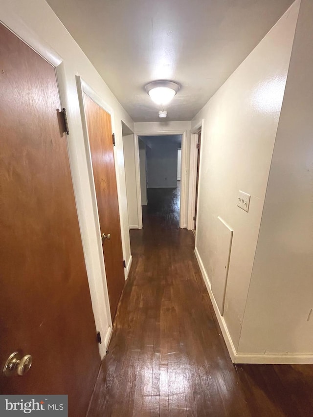 711 Oak Hill Ave, Hagerstown, MD 21740 - hallway featuring hardwood / wood-style floors and baseboards