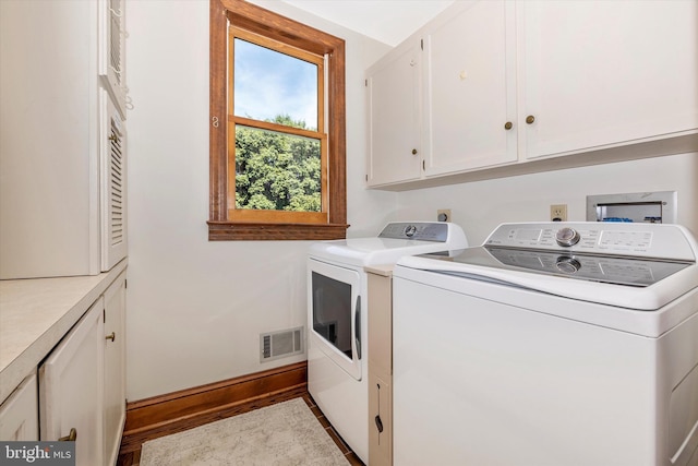 8423 Yellow Springs Rd, Frederick, MD 21702 - washroom featuring cabinet space, washing machine and clothes dryer, and baseboards