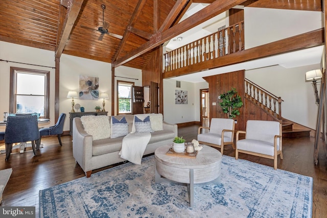 8423 Yellow Springs Rd, Frederick, MD 21702 - living room featuring wood finished floors, stairway, baseboards, high vaulted ceiling, and wooden ceiling with exposed beams