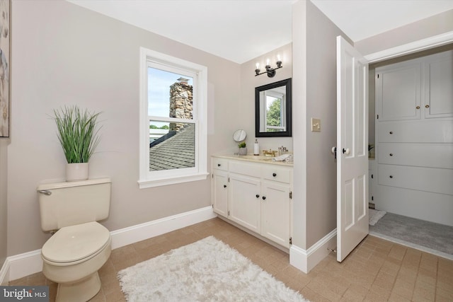 8423 Yellow Springs Rd, Frederick, MD 21702 - bathroom featuring vanity, baseboards, and toilet