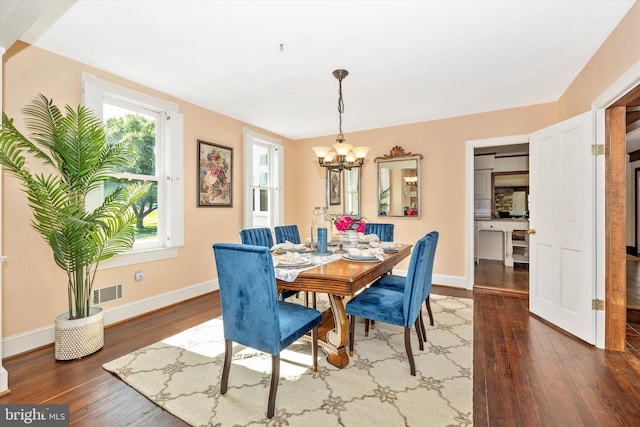 8423 Yellow Springs Rd, Frederick, MD 21702 - dining room with a chandelier, hardwood / wood-style floors, and baseboards