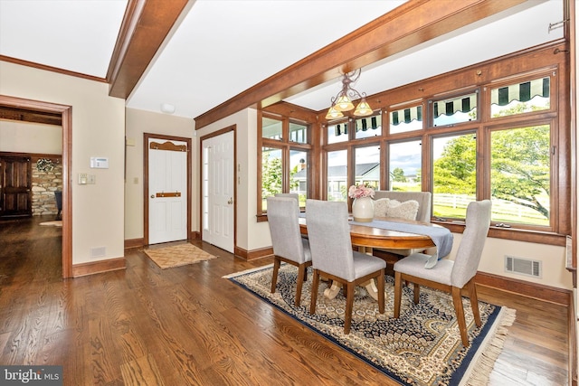 8423 Yellow Springs Rd, Frederick, MD 21702 - dining space with baseboards, dark wood finished floors, and ornamental molding