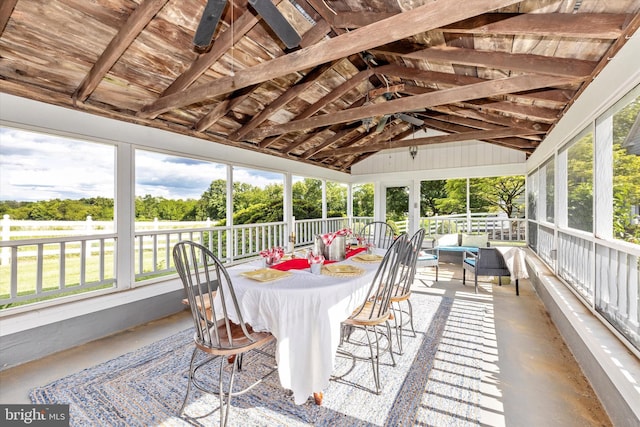 8423 Yellow Springs Rd, Frederick, MD 21702 - sunroom featuring vaulted ceiling, view of scattered trees, an outdoor living space, and plenty of natural light