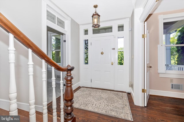 8423 Yellow Springs Rd, Frederick, MD 21702 - entrance foyer with baseboards, dark wood-style flooring, and stairway