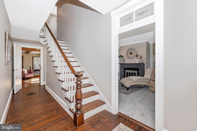 8423 Yellow Springs Rd, Frederick, MD 21702 - stairway featuring wood finished floors, a fireplace, and baseboards