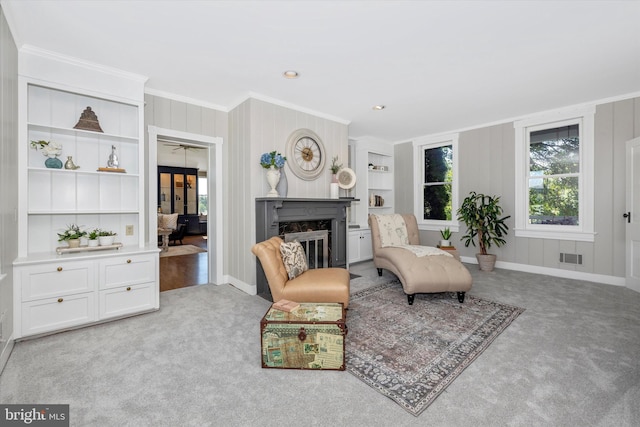 8423 Yellow Springs Rd, Frederick, MD 21702 - living area with crown molding, light colored carpet, built in features, and plenty of natural light