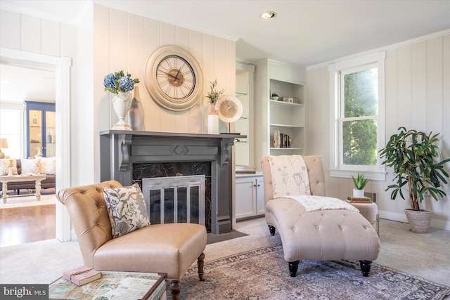 8423 Yellow Springs Rd, Frederick, MD 21702 - sitting room featuring carpet floors, crown molding, a fireplace, and built in shelves