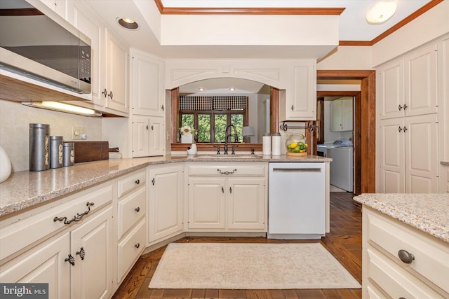 8423 Yellow Springs Rd, Frederick, MD 21702 - kitchen with stainless steel microwave, dishwasher, a sink, independent washer and dryer, and white cabinets