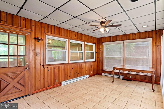 201 Village Rd, Harrisburg, PA 17112 - unfurnished sunroom featuring a baseboard heating unit and plenty of natural light