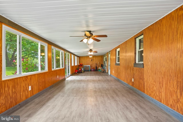201 Village Rd, Harrisburg, PA 17112 - unfurnished sunroom featuring wood finished floors and wooden walls