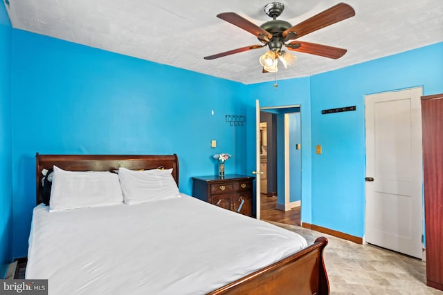 201 Village Rd, Harrisburg, PA 17112 - bedroom with baseboards and ceiling fan