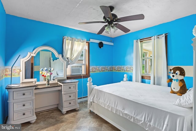 201 Village Rd, Harrisburg, PA 17112 - bedroom with cooling unit, stone finish flooring, ceiling fan, and a baseboard heating unit