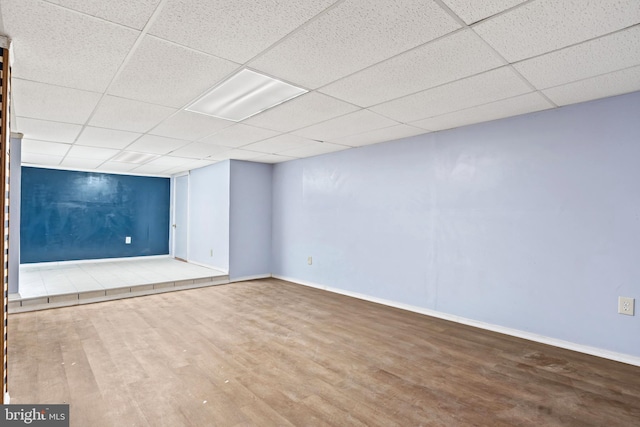 201 Village Rd, Harrisburg, PA 17112 - unfurnished room featuring wood finished floors, a drop ceiling, and baseboards