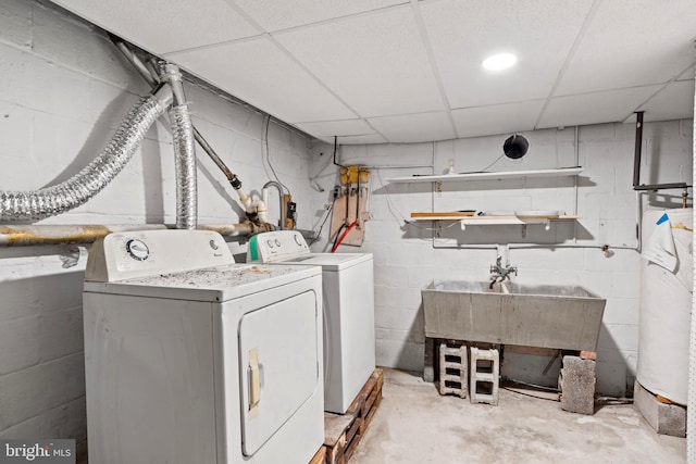 201 Village Rd, Harrisburg, PA 17112 - laundry room with washing machine and dryer and concrete block wall