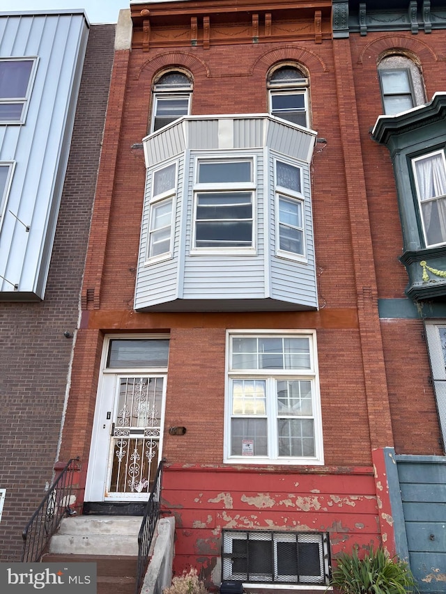 1523 W Norris St, Philadelphia, PA 19121 - view of property featuring brick siding