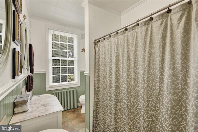 410 Windsor St, Wyomissing, PA 19610 - bathroom with radiator heating unit, toilet, ornamental molding, wainscoting, and vanity