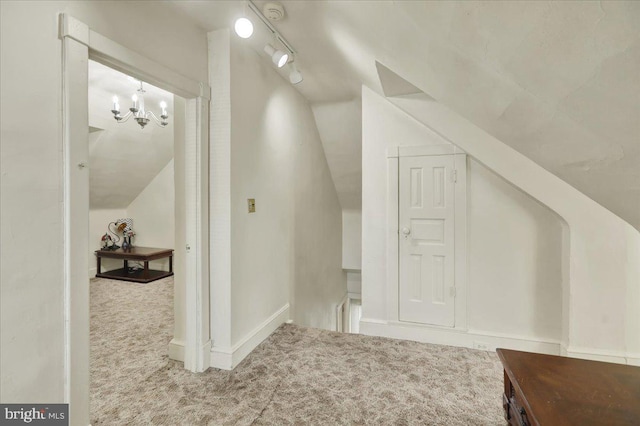 410 Windsor St, Wyomissing, PA 19610 - additional living space featuring carpet flooring, lofted ceiling, and a chandelier