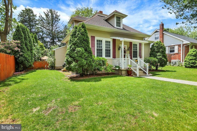 410 Windsor St, Wyomissing, PA 19610 - view of front of property featuring a shingled roof and a cooling unit