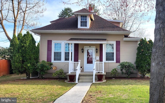 410 Windsor St, Wyomissing, PA 19610 - bungalow-style house featuring roof with shingles and a chimney