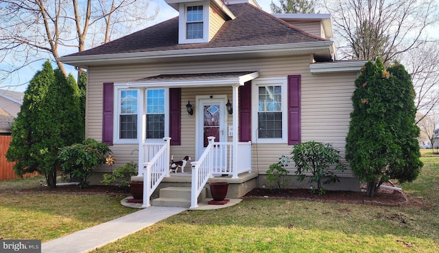 410 Windsor St, Wyomissing, PA 19610 - view of front of home featuring a front lawn and a shingled roof