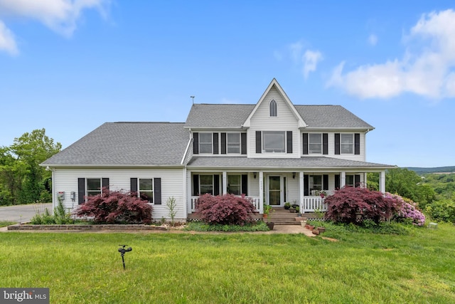 9997 Baltimore National Pike, Myersville, MD 21773 - view of front of house featuring a front lawn, a porch, and roof with shingles