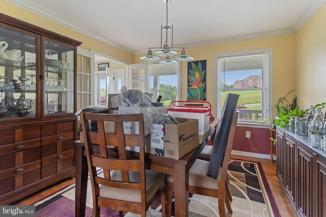 9997 Baltimore National Pike, Myersville, MD 21773 - dining room featuring light wood-type flooring, healthy amount of natural light, ornamental molding, and baseboards