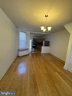 2012 E Glenwood Ave, Philadelphia, PA 19124 - unfurnished living room featuring a chandelier and wood finished floors