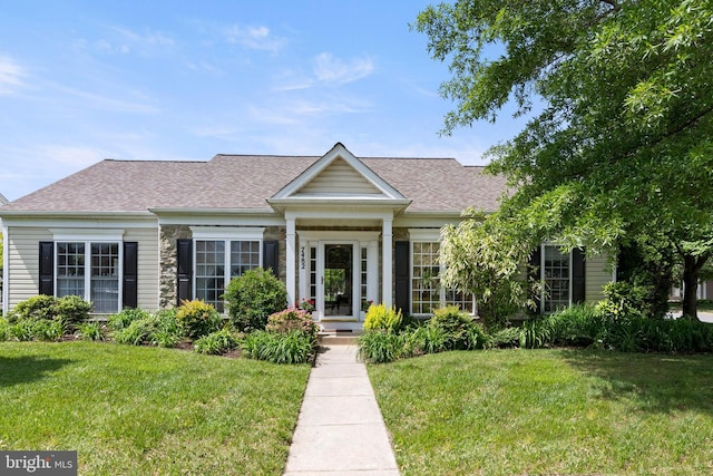 7482 Jeffreys Way, Easton, MD 21601 - view of front of house with a front yard and roof with shingles