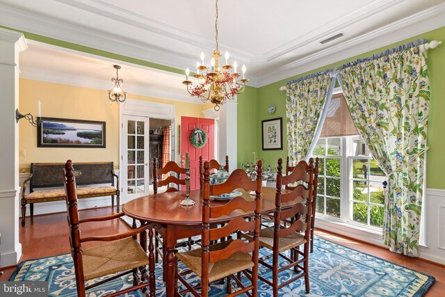 7482 Jeffreys Way, Easton, MD 21601 - dining space with wood finished floors, crown molding, and a chandelier